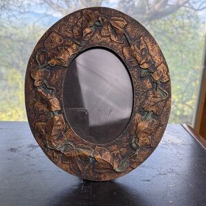 Vintage Oval Frame with Leaf Motif